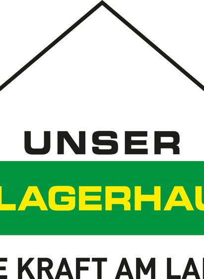 A simple logo with a house roof. It features the words "OUR WAREHOUSE" and "THE POWER IN THE COUNTRY" in yellow and black on a green background. | © Lagerhaus