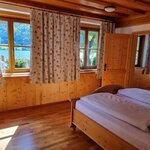 Photo of Double room, shower, toilet, lake view | © Andreas Grill
