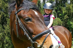 Kind auf Pferd